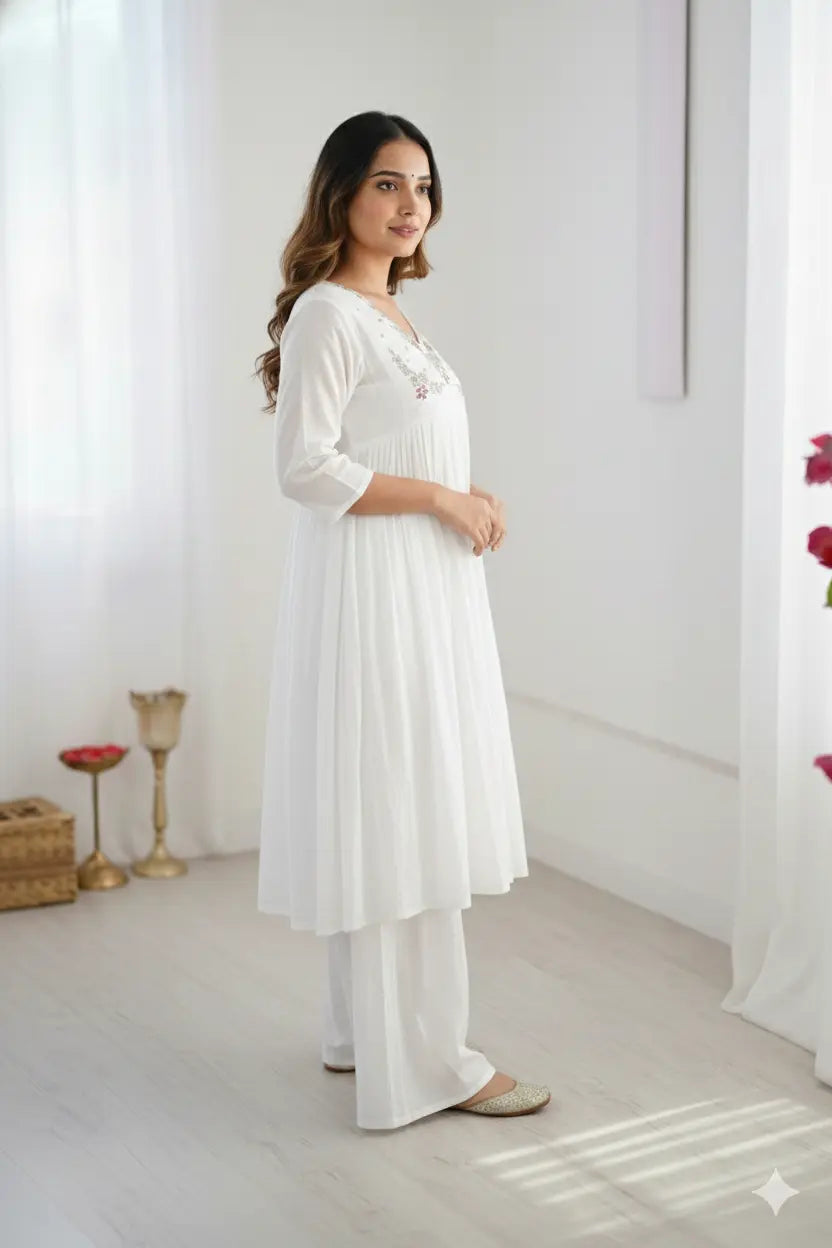 Women's elegant white pleated kurta with bead work detailing